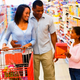 A family uses their spending power to shop. (Thinkstock)